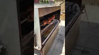 Chickens on a spit rotisserie