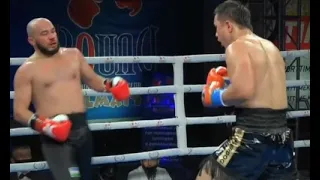 Казахстанский тяжеловес встал после нокдауна и «удосрочил» узбека в бою за титулы WBC и WBA