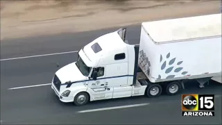 California Highway Patrol in pursuit of a semi-truck