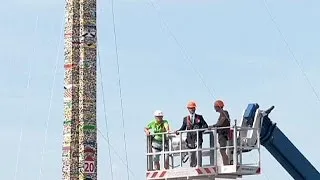 Scaling new Lego heights: children build world's tallest tower in Milan