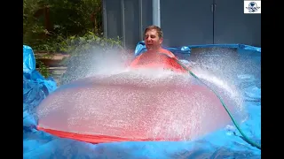 Explosión de globo de agua gigante en cámara lenta