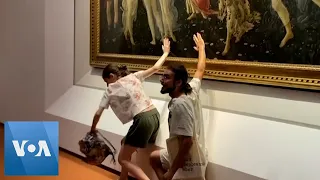 Italian Climate Activists Glue Hands to Botticelli Painting