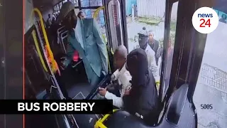 WATCH | Rifle-wielding robbers steal phones and cash from passengers on bus in Gugulethu