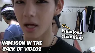 namjoon in the back of videos