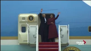 Outoing President Obama and his wife Michelle wave goodbye
