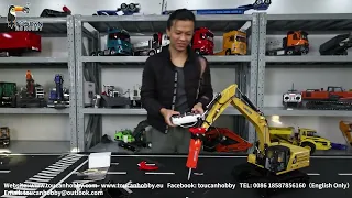 Unbox HUINA 1/16 K961 RC Hydraulic Excavator. light, manual quick release. Ripper and break hammer.