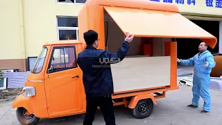 orange Piaggio truck------UD
