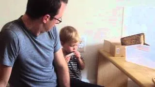 Montessori on the Double - 18 month old plays along during harmonica performance