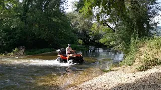 CF moto 450L in river