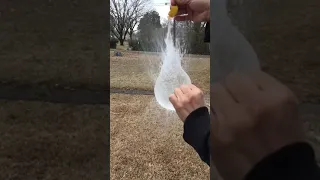 Slow motion water balloon popping