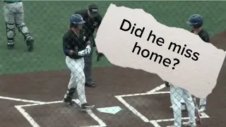 Home run. Did he touch home? Umpire said he is out.