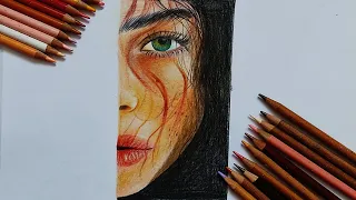 Drawing the profile of the face with color pencils