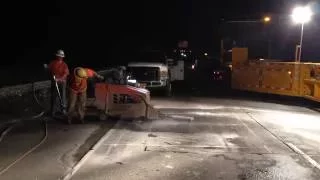 Crews working behind a mobile barrier on I-5 near Woodland