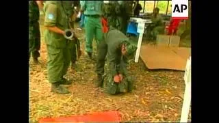 Guatemala - Guerrillas hand over weapons