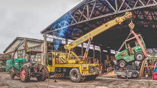 Mobilkran ADK Motorenanlassen und Pomßen Traktor verladen