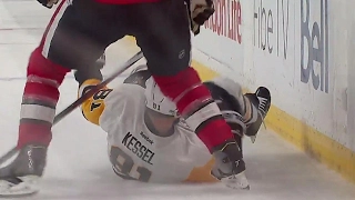 Phaneuf gives Kessel a rough ride along the boards