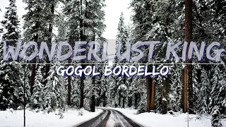 Gogol Bordello - Wonderlust King (Lyrics) - Mountains Video