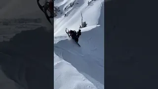 Snowmobile Hill Climb Crash. Rolls From Top of Cornice to Bottom