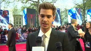 EVENT CAPSULE CHYRON - Actors Andrew Garfield, Emma Stone and Jamie Foxx appear on the Red Carpet at