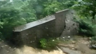 Frightening Moment Captured on Camera as Flood Collapses Wall