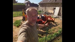 Breaking up and removing a concrete patio with a Kubota BX2350 and s&c 35 18