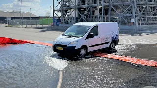 Effortless Flood Protection: Watch the Barrier Rebound as the Vehicle Pass