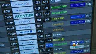 Hundreds Of Flights Canceled As Snowstorm Blankets Midwest