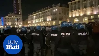 Police confront anti-COVID lockdown protesters in Italy