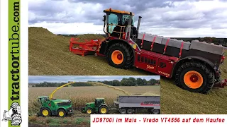 JD 9700i im Mais und Vredo Selbstfahrer VT4556 auf dem Haufen