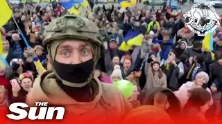 Ukrainian soldier and residents celebrate Russian withdrawal from Kherson