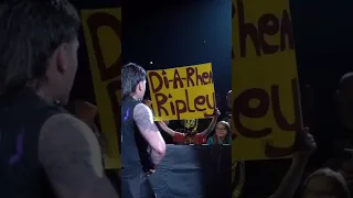 Dominik Mysterio Rips Up A Negative Rhea Ripley Sign!