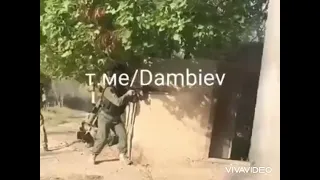 Footage of Tajik special forces soldiers fighting in a village in Kyrgyzstan.