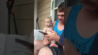 Toddler Hugs Dad After Hearing Thunder - 1353569