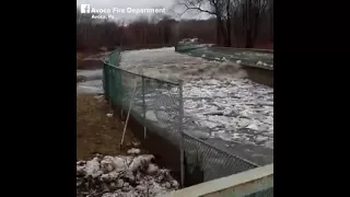 Avoca, PA - Water rushes back upstream after ice jam broken up