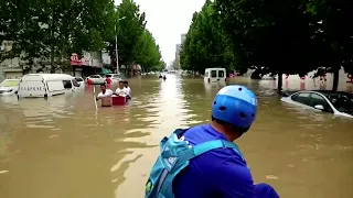 Tens of thousands evacuated from floods in China