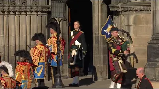 The Queen leaves Scotland for the final time as a bagpiper plays the lament