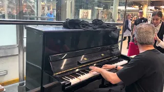 Cool person plays the piano in London