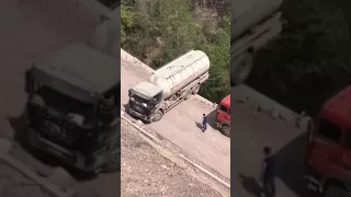 Truck driver 3 point turn up the mountain; mad skills