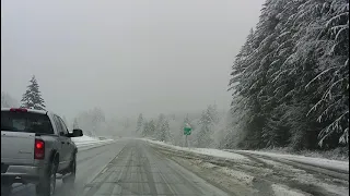 SNOQUALMIE PASS CHAINS REQUIRED STATE PATROL PLOWS