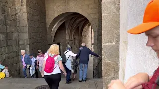 Bagpipes going into the Santiago Cathedral plaza.