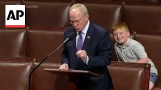 Watch: Congressman's son steals show on House floor, hamming it up for cameras