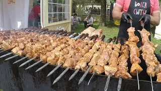 Russian Street Food Festival. Grilled Meat, Huge Skewers, Sausages. Traditional Food. Minsk, Belarus