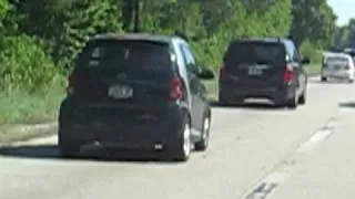 Smart Car passes me on I-95 Northbound