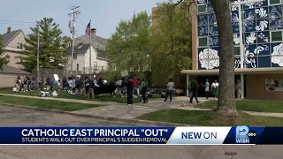 Students stage walkout in protest of removal of Catholic school principal