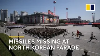 North Korea drops missiles from military parade in sign of denuclearisation
