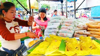 Most popular street food - Cambodia yellow pancake, spring roll, congee, fried noodles, wonton