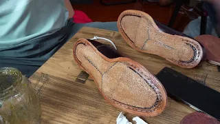 The process of making handmade Oxford shoes.