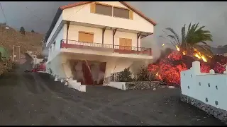 La Palma, Spain. House collapsing under the pressure of lava