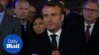 Emmanuel Macron: 'We will rebuild Notre Dame together'