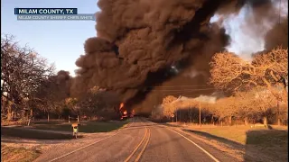 Massive fire erupts after train, 18-wheeler collide in Texas